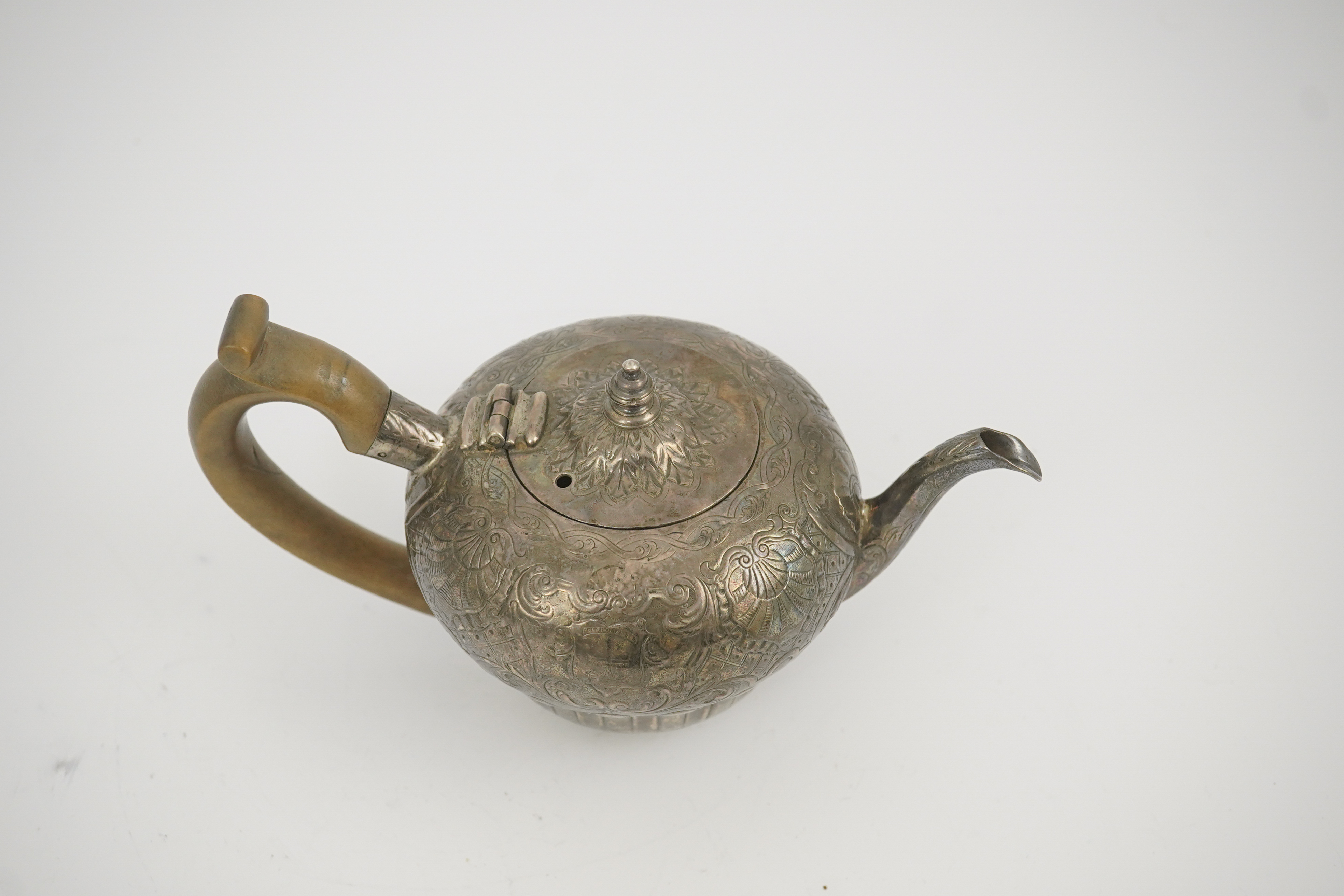 An 18th century Irish silver inverted pyriform bachelor's teapot, maker E.R